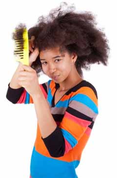 girl combing hair